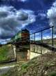 поезд на мосту по дороге в Екабпилс