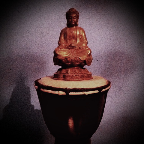 Ом на буддистском барабане.